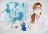 Scientist working in the lab with futuristic interface