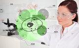 Chemist examining green cell interface