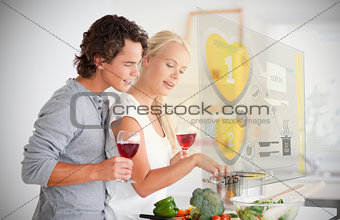 Couple making dinner using interface instructions