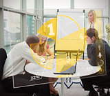 Business people using yellow pie chart interface