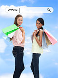 Happy girls with their shopping bags under address bar