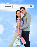 Happy couple with their shopping bags under address bar