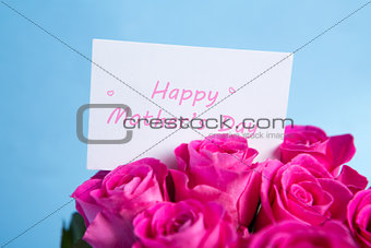 Bouquet of pink roses with mothers day card