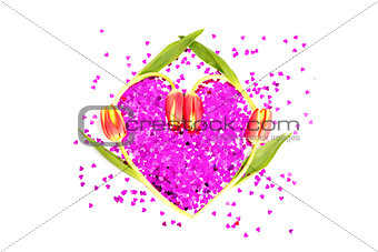 Four tulips in a heart shape with confetti