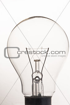 Clear light bulb in black and white