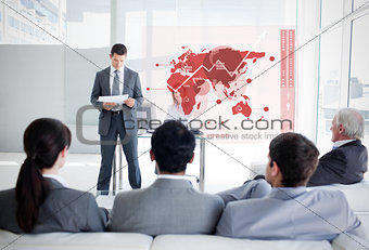 Business people listening and looking at red map diagram interface
