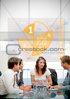 Business workers using yellow pie chart interface