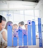 Group of colleagues using blue chart interface