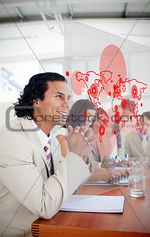 Happy businessman looking at futuristic map interface