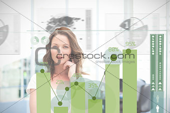 Blonde businesswoman using green chart interface