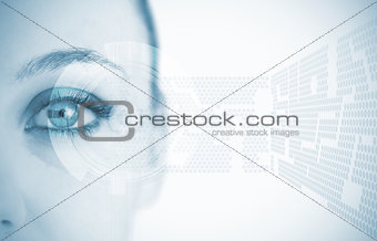 Close up of woman eye in blue with futuristic background