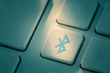 Blue bluetooth button on keyboard
