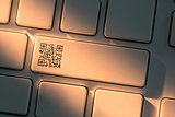 Keyboard with close up on qr code symbol