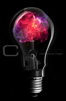 Pink flame inside light bulb