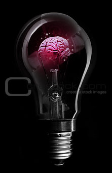 Pink brain inside light bulb