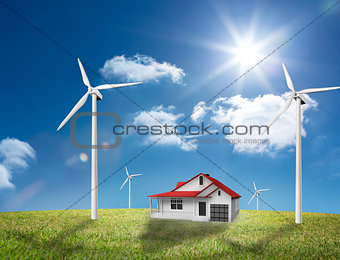 House in the middle of a turbine field