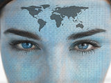Attractive blue eyed woman with binary coding and map on face