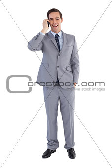 Happy businessman on the phone