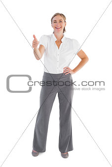 Businesswoman showing her thumb up