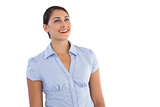 Smiling young businesswoman standing alone