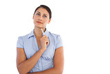 Thoughtful attractive businesswoman holding a pen