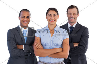 Small group of smiling business people standing together