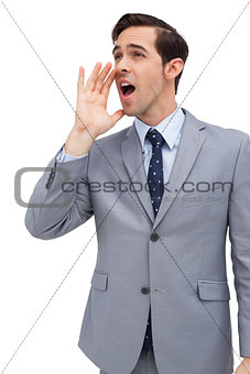 Young businessman yelling