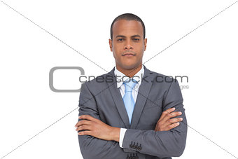 Charismatic businessman with arms crossed