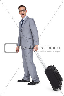 Businessman with a trolley being surprised