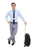 Handsome businessman standing with his suitcase
