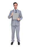 Happy businessman holding a clipboard