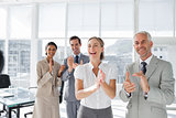 Group of business people applauding
