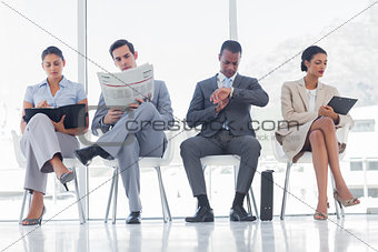 Waiting room with business people
