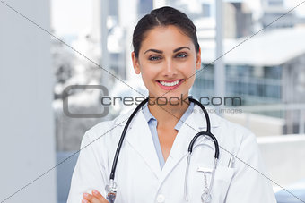 Smiling doctor standing