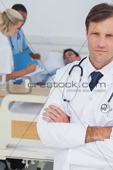 Doctor standing and looking at the camera
