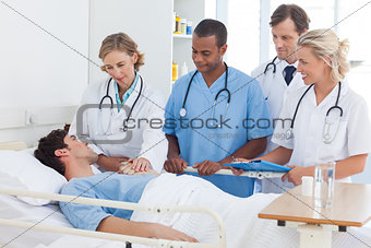 Medical team talking to a patient