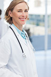 Smiling woman doctor with a stethoscope