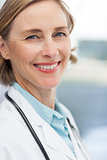 Close up of a smiling woman doctor