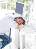 Designer asleep at his desk