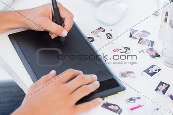 Male hands using graphics tablet