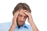 Tanned man having a headache