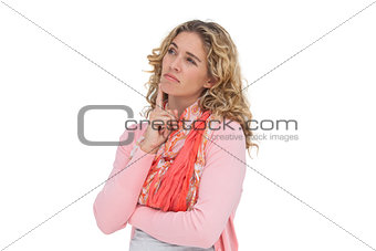 Thoughtful blonde woman posing