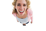 Overhead of laughing woman standing