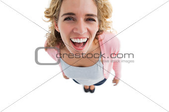 Overhead of laughing woman standing