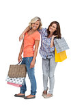 Two friends holding shopping bags