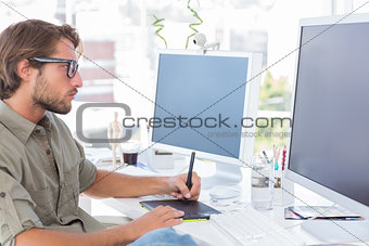 Graphic artist using graphics tablet