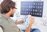 Photo editor looking at colour wheel