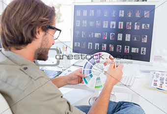 Photo editor looking at colour wheel