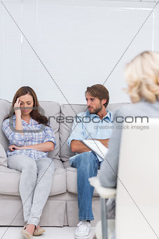 Woman crying on the couch