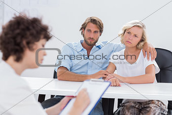Couple looking thoughtful during a session